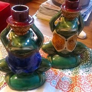 Pair of glazed pottery frog candlesticks